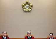 헌재 "동원훈련 통지서 미전달 아버지 처벌...구 병역법 위헌"