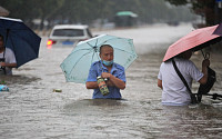 중국 홍수 피해가 쏘아 올린 돼지 열병 불안감