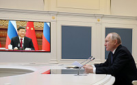 푸틴, 시진핑 내년 모스크바 초대…미국 “협력 우려스럽다”