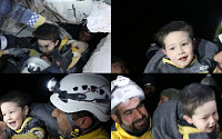 튀르키예 강진 건물 잔해에 파묻힌 아이, 구조되자 ‘방긋’