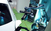 두산로보, 협동로봇 활용 전기차 자동 충전 솔루션 운영