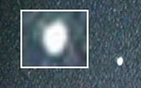 광화문 상공에 은백색 UFO 포착…의도적 대기촬영 성공