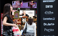 올여름 전력수요 역대 최고치 예상…명동은 문열고 냉방 풀가동 [포토]