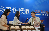 [포토][2014 중국식품박람회]중국언론 인터뷰하는 (주)명신 이향우 이사