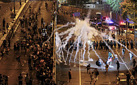 [포토] 홍콩 도심 점거 시위 이틀째, 최루탄 발사하는 경찰들