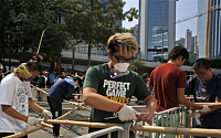 3주째 접어든 홍콩 시위…골드만, 성장 전망 하향