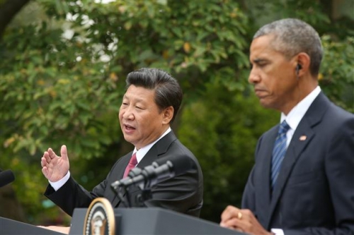 ▲미국 워싱턴 D.C. 백악관에서 25일(현지시간) 시진핑(왼쪽) 중국 국가주석과 버락 오바마 미국 대통령이 정상회담 후 공식 기자회견을 하고 있다. 사진=AP/뉴시스