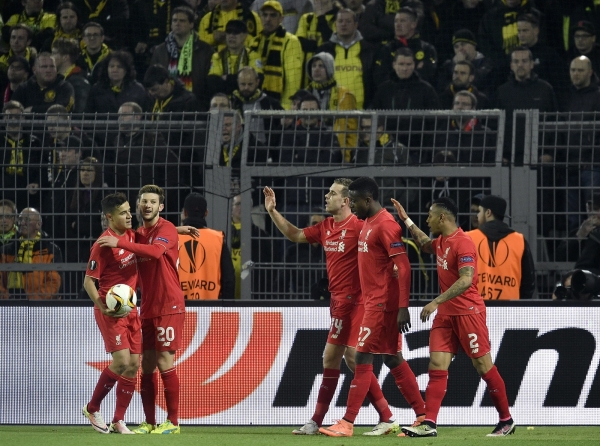 ▲8일(한국시간) 독일 도르트문트의 베스트 팔렌 스타디움에서 열린 2015-2016 유럽축구연맹(UEFA) 유로파리그 8강 1차전 도르트문트와 경기에서 오리기의 선제골이 터진 뒤 리버풀 선수들이 함께 기뻐하고 있다. (AP/뉴시스)