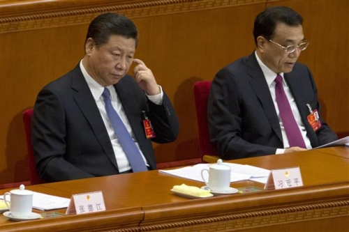 ▲시진핑(왼쪽) 중국 국가주석과 리커창 총리가 3월 9일(현지시간) 전국인민대표대회(전인대)에 자리를 함께하고 있다. 베이징/AP뉴시스 