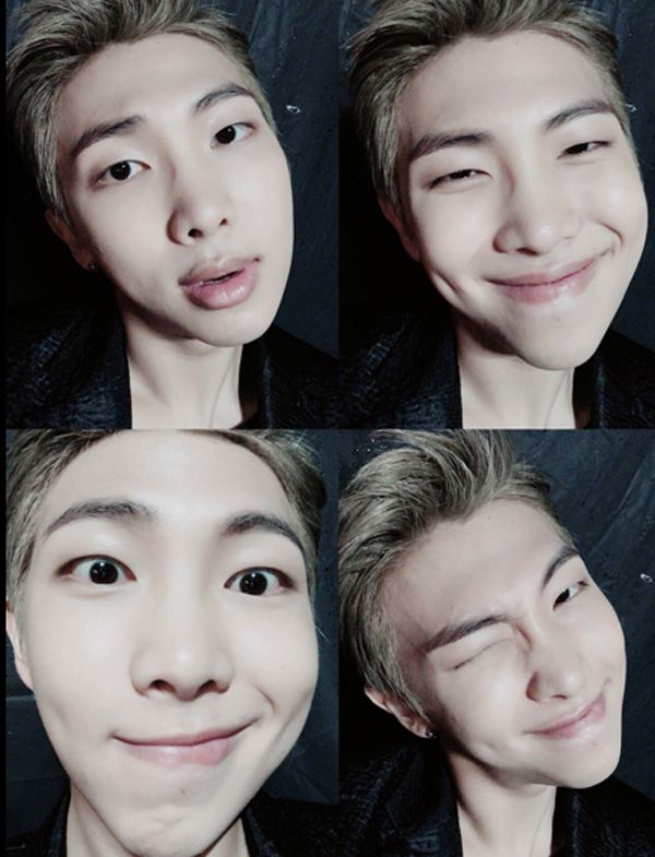 ▲방탄소년단 랩몬스터가 팬들을 향해 웃음을 전했다.(사진=방탄소년단 트위터)