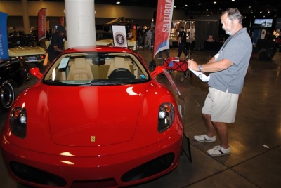 ▲도널드 트럼프 미국 대통령이 소유했던 페라리 F430 스포츠자동차가 미 플로리다 주 경매 시장에서 3억 원에 팔렸다. 출처 = AFP연합뉴스