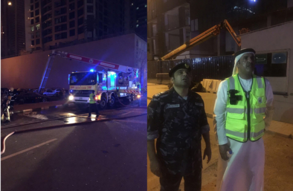 ▲4일(현지시간) 두바이 86층 건물 토치타워에서 화재가 발생했다. 화재 진압을 위해 출동한 소방대원과 불타는 토치타워를 지켜보는 경찰.(출처= 트위터(@alialshouk))