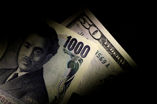 ▲일본 1000엔 지폐(앞)과 미국 50달러 지폐. 로이터연합뉴스
