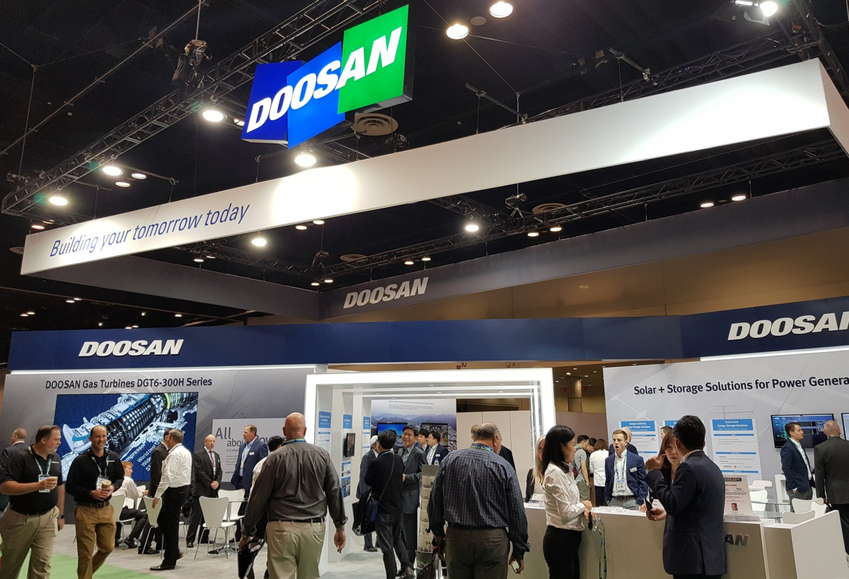 ▲4~6일 미국 올랜도 오렌지 카운티 컨밴션 센터에서 열리는 ‘파워젠 인터내셔널 2018’ 전시회의 두산 부스 전경. (사진제공=두산그룹)