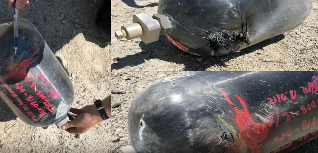 ▲총격테스트 후의 수소용기 모습. 터지지 않은 채 외부에 총알의 흔적들이 남아있다. (출처='두산뉴스룸' 캡처)