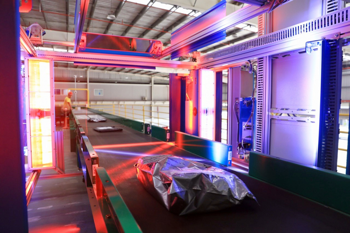 ▲ITS(Intelligent Scanner)를 통과한 택배상품들이 휠소터(Wheel Sorter)로 자동 분류되고 있는 모습  (사진제공=CJ대한통운)