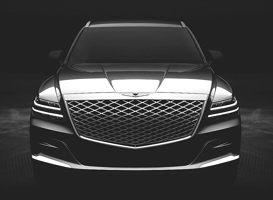 ▲강렬한 인상의 5각형 '크래스트 그릴'과 헤드램프를 위아래로 양분한 '쿼드 램프'는 제네시스의 디자인 특징으로 자리잡았다.  (사진제공=제네시스)