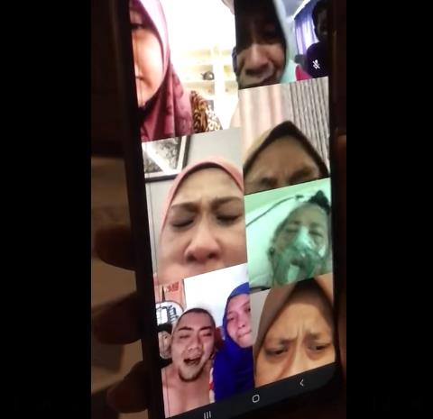 ▲코로나19 감염을 막기 위해 영상통화로 어머니의 마지막 임종을 지킨 말레이시아 가족. (출처=트위터 캡처 )