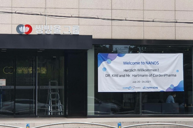 ▲용산구에 위치한 나노스 사무실 외곽에 붙은 코든파마 방문단 환영 현수막(사진=구성헌 기자@)