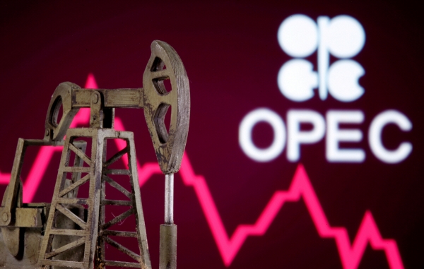 ▲3D 프린터로 인쇄된 오일 팸프 잭이 그래프와 석유수출국기구(OPEC) 로고 앞에 있다. 로이터연합뉴스
