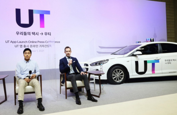 ▲김기년 UT COO(왼쪽)와 톰 화이트 UT CEO가 1일 열린 UT 앱 출시 온라인 간담회에 참석했다.  (사진제공=UT)