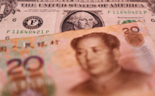 ▲미국 달러와 중국 위안화의 모습이 보인다. 로이터연합뉴스
