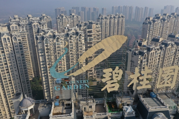 ▲중국 전장시의 한 건물 옥상에 2021년 10월 31일 비구이위안 로고가 보인다. 전장(중국)/AFP연합뉴스
