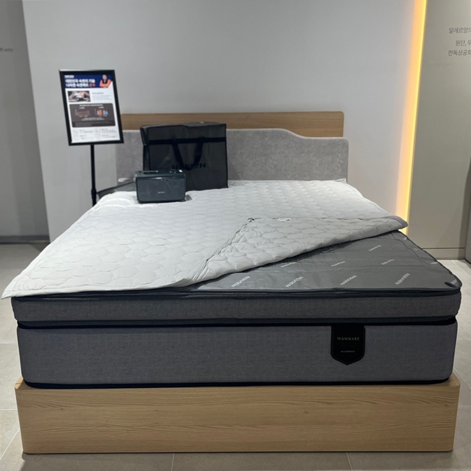 ▲알레르망 가두점 매장에 비치된 나비엔 숙면매트 온수 'EQM553'. (사진제공=경동나비엔)