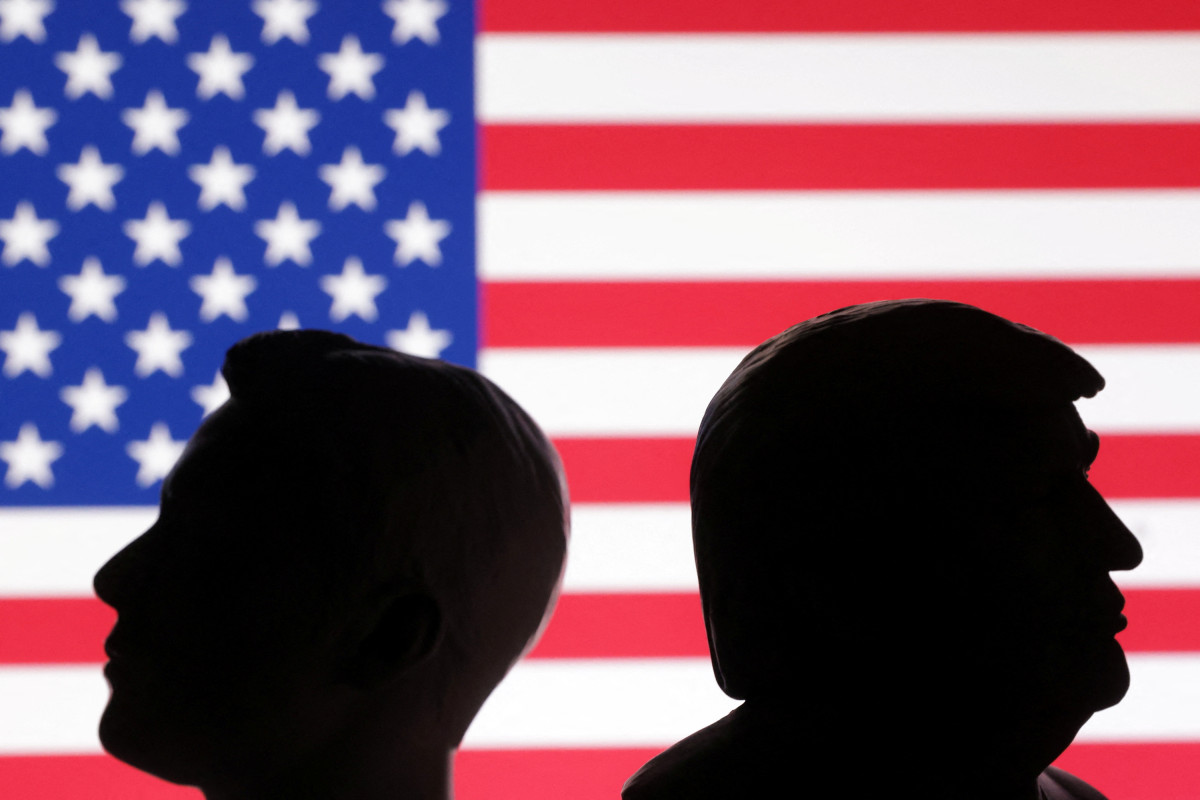 ▲등 돌리고 있는 일론 머스크 테슬라 최고경영자(CEO·왼쪽)와 도널드 트럼프 미국 대통령 일러스트레이션 이미지.  (로이터연합뉴스)