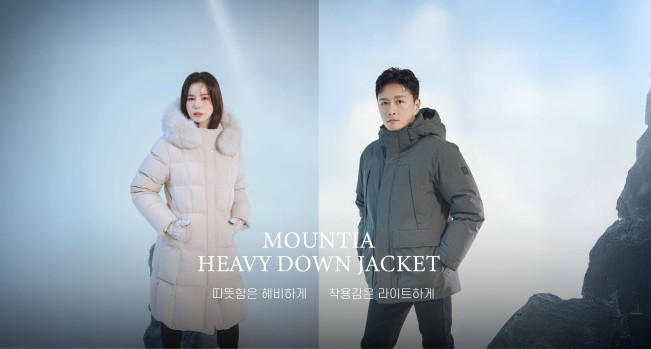 ▲마운티아 모델 박시은은 롱 다운 자켓 '윈터'를, 진태현은 헤비 덕다운 자켓 '도토모'를 착용하고 있다. (사진제공=마운티아)