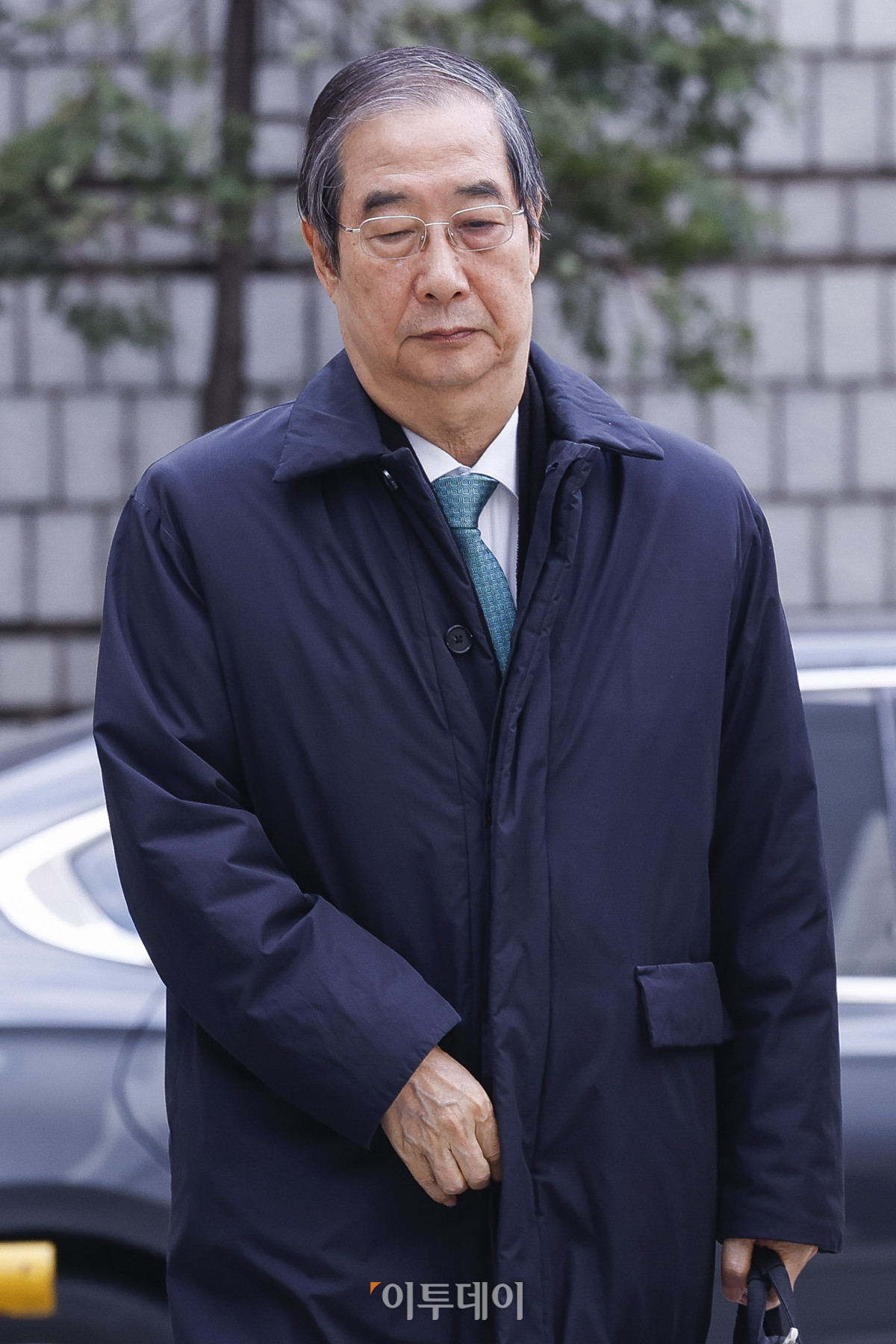 ▲한덕수 전 국무총리가 26일 서울 서초구 서울중앙지방법원에서 열린 내란 우두머리 방조, 내란 중요임무 종사 등 혐의 사건 1심 결심 공판에 출석하고 있다. 조현호 기자 hyunho@