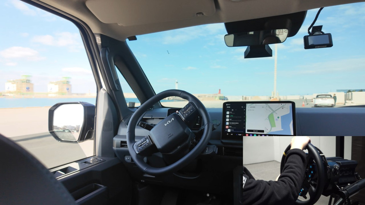 ▲기아는 27일 제주도에서 기아, 쏘카, 자율주행 스타트업 에스유엠(SUM), KT와 국토교통부, 제주특별자치도, 경찰청, 한국교통안전공단 등 주요 관계자들이 참석한 가운데 ‘원격 운전 실증 성과 공유회’를 열고 원격 운전 기술 개발 현황 등을 공개했다. 원격 운전 실증 차량의 모습 (사진=기아)