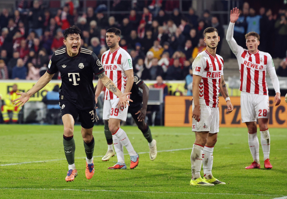 ▲14일(현지시간) 독일 쾰른에서 열린 독일 분데스리가 1.FC 쾰른과 바이에른 뮌헨의 경기에서 바이에른 뮌헨의 김민재(사진 왼쪽)가 팀의 1-2 골을 터뜨린 뒤 기뻐하고 있다. (EPA/연합뉴스)