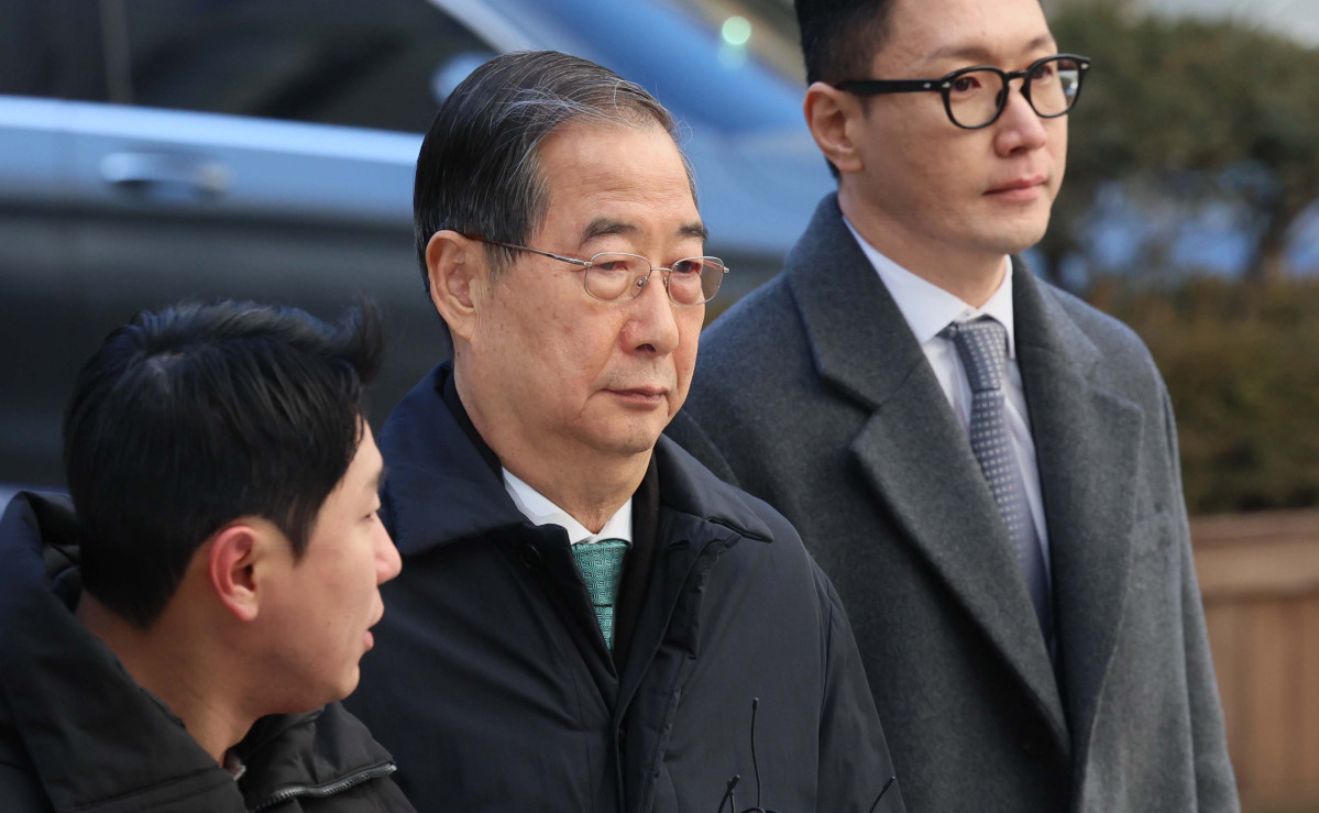 ▲한덕수 전 국무총리가 21일 서울 서초구 서울중앙지방법원에서 열린 내란 우두머리 방조, 내란 중요임무 종사 혐의 사건 1심 선고공판에 출석하고 있다. 신태현 기자 holjjak@